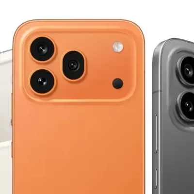 Três smartphones coloridos com câmaras triplas traseiras