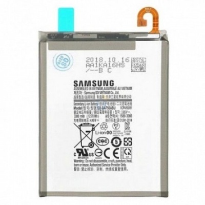 Bateria Samsung Li-ion para telemóvel com etiquetas e símbolos visíveis