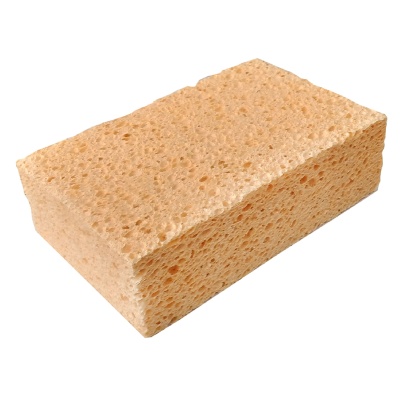 Esponja retangular bege com textura porosa