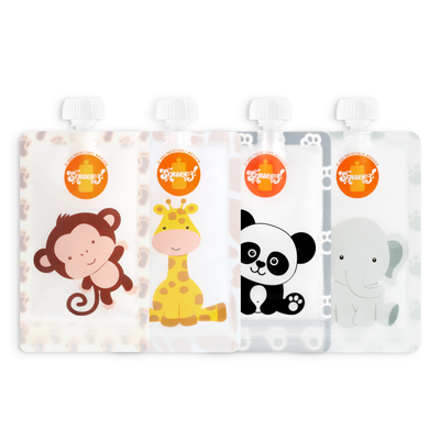 Quatro doses de plástico com desenhos de macaco, girafa, panda e elefante