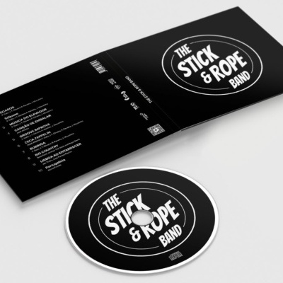 Disco de vinil e capa preta com marca THE STICK & ROPE BAND
