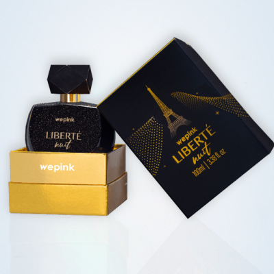 Frasco de perfume preto e caixa preta e dourada com texto wepink LIBERTÉ nuit