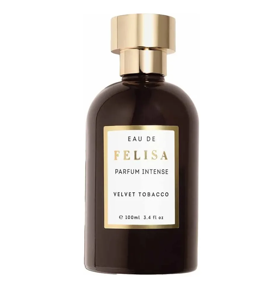 Frasco de perfume escuro com rótulo branco e tampa dourada.