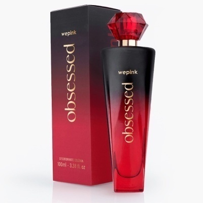 Frasco de perfume vermelho com tampa facetada e embalagem preta e vermelha