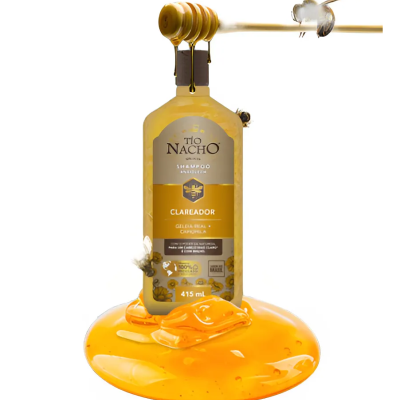 Frasco de champô Tio Nacho com 415 ml sobre líquido alaranjado tipo mel com abelhas