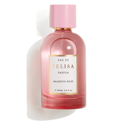 Frasco de perfume rosa com etiqueta branca e tampa rosa