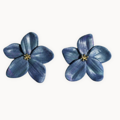 Brincos flor azul com centro dourado
