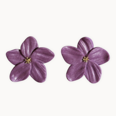 Brincos florais roxos com centro dourado