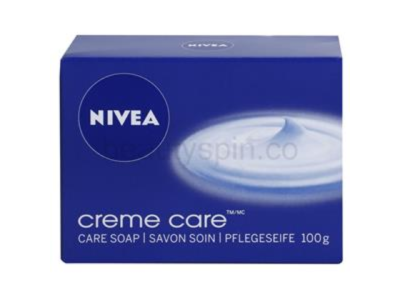 Caixa azul de sabonete Nivea Creme Care com texto branco e imagem de creme.