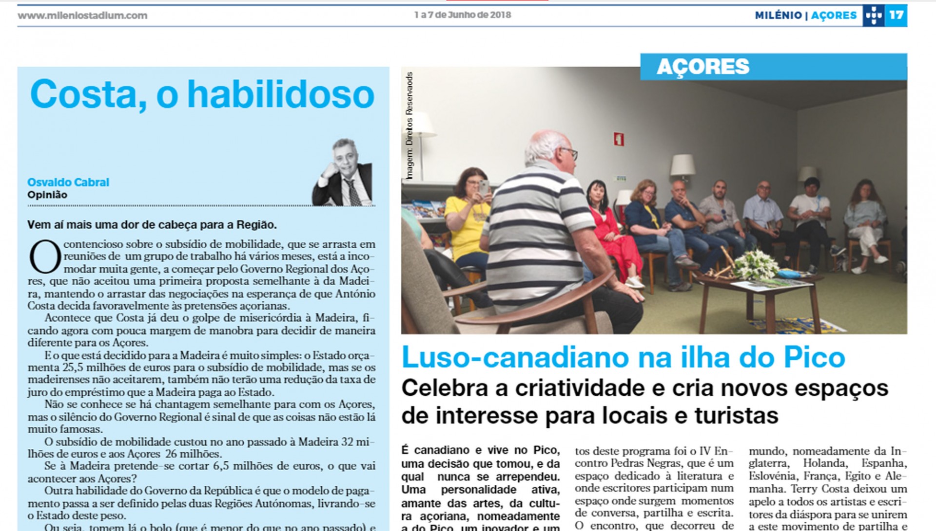 Página de jornal com artigos e fotografia de grupo em ambiente interior