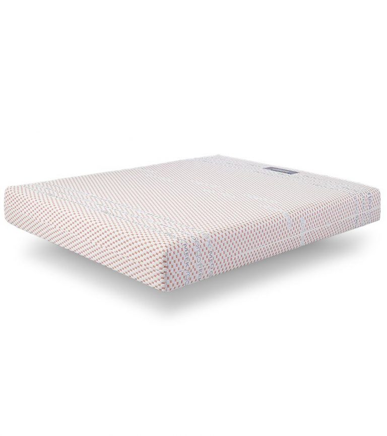 Colchão branco com padrão de pontos vermelhos e azul claro