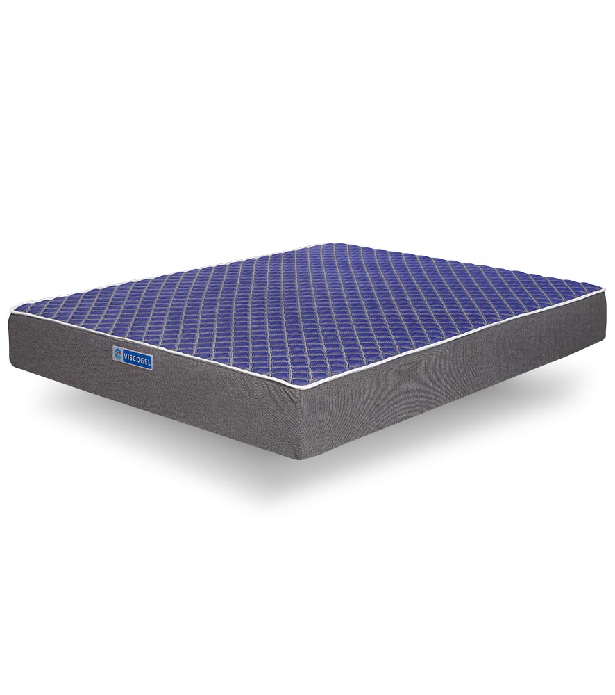 Colchão azul com padrão hexagonal e laterais cinzentas