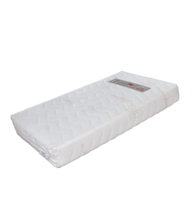 Colchão branco com padrão ondulado e etiqueta retangular.