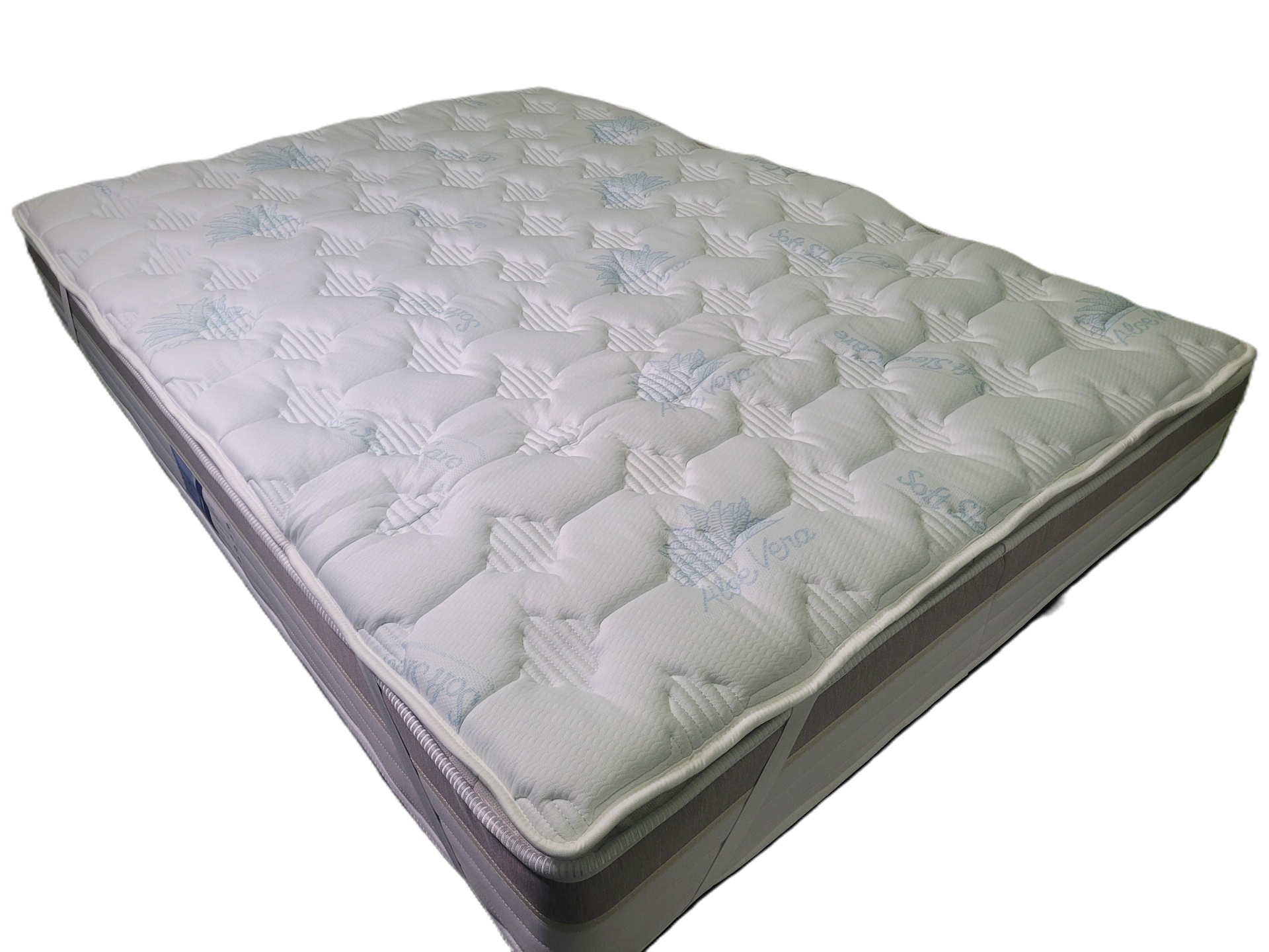 Colchão branco acolchoado com texto azul Aloe Vera e Soft Safe, borda cinza e branca