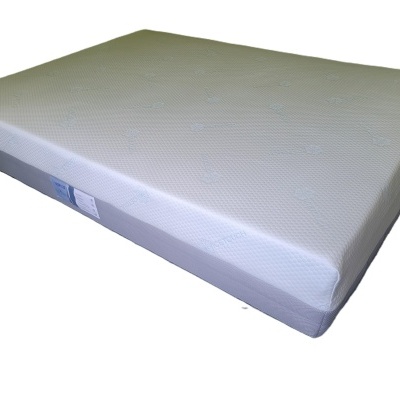 Colchão branco com padrão hexagonal e laterais cinzentas com etiqueta