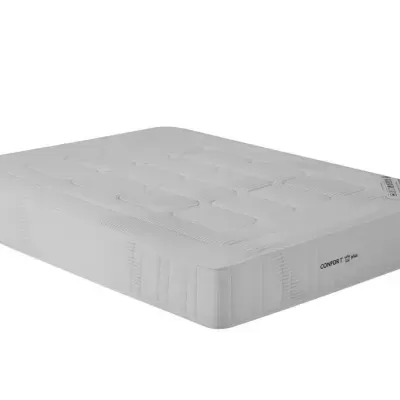 Colchão branco acolchoado com etiqueta COMFORT ONSP