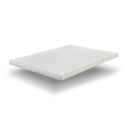 Colchão branco com padrão geométrico ondulado