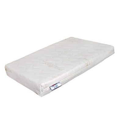 Colchão de espuma branco com padrão ondulado e etiqueta lateral