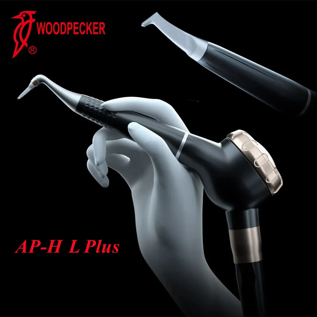 Polidor de ar Woodpecker AP-H L Plus modos supragingival e subgengival dois em um Instrumento odontológico preto com detalhes metálicos segurado por mão cinzenta com texto WOODPECKER AP-H L Plus