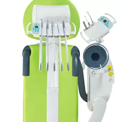 Cadeira dentária verde com instrumentos e painel de controlo
