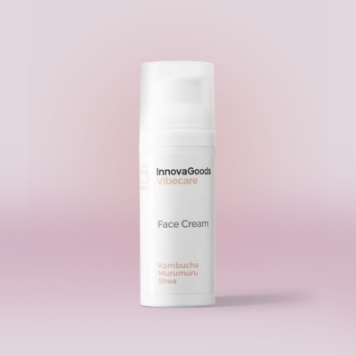 Frasco branco de creme facial InnovaGoods Vibecare com texto em preto e rosa sobre fundo rosa claro
