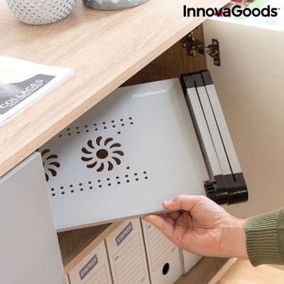 Suporte dobrável cinza claro com furos em espiral e texto InnovaGoods num móvel de madeira clara