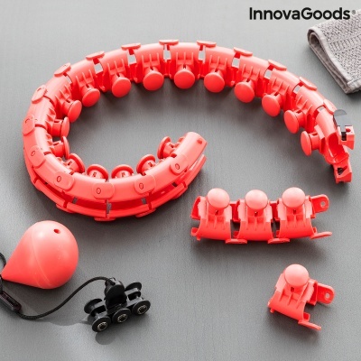 Conjunto de massageadores vermelhos InnovaGoods sobre superfície cinza