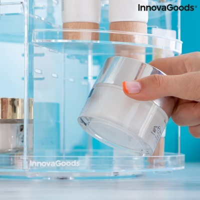 Organizador transparente para cosméticos com frasco branco e mão feminina