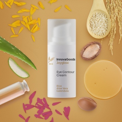 Frasco de creme para olhos InnovaGoods com ingredientes naturais sobre fundo castanho claro