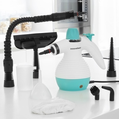Vaporizador portátil InnovaGoods branco e azul claro com acessórios num balcão de cozinha