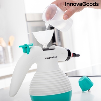 Pulverizador manual InnovaGoods branco e verde numa cozinha moderna