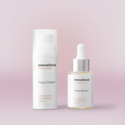 Dois frascos de creme e sérum facial InnovaGoods com design branco e prata sobre fundo rosa.