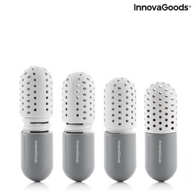 Quatro purificadores de ambiente brancos e cinza da InnovaGoods, design cápsula perfurada.