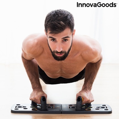 Prancha de exercícios para flexões da InnovaGoods com homem a fazer flexões