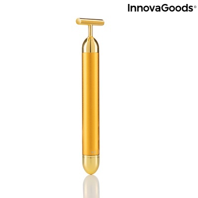 Dispositivo dourado cilíndrico com barra em T superior e texto InnovaGoods