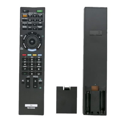 Comando TV preto com botões coloridos e tampa da bateria removida