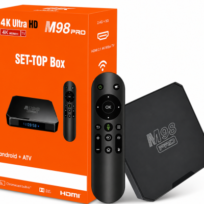 Set-top box e comando remoto preto ao lado da embalagem laranja com texto e ícones