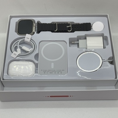 Conjunto de smartwatch preto com acessórios em caixa branca