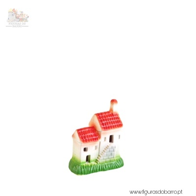Figura decorativa de duas casinhas cerâmicas com telhado vermelho e base verde