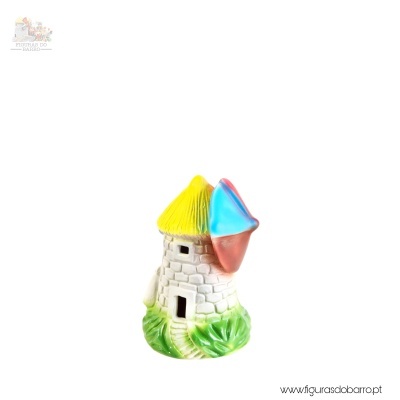 Figura decorativa casa de pedra com telhado amarelo e balão azul e vermelho