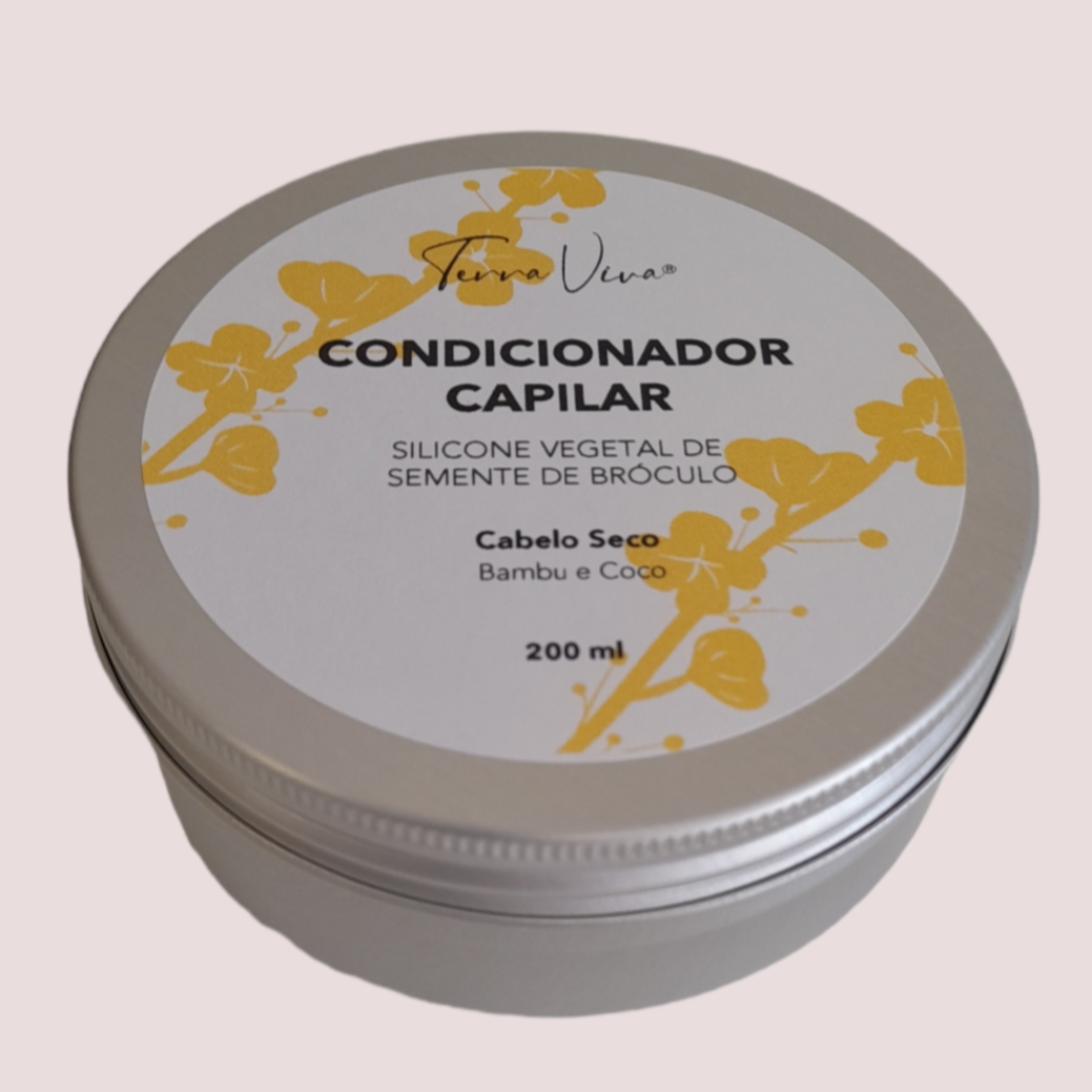 Condicionador Capilar em Creme Pote prateado de condicionador capilar Terra Viva com rótulo branco e flores amarelas