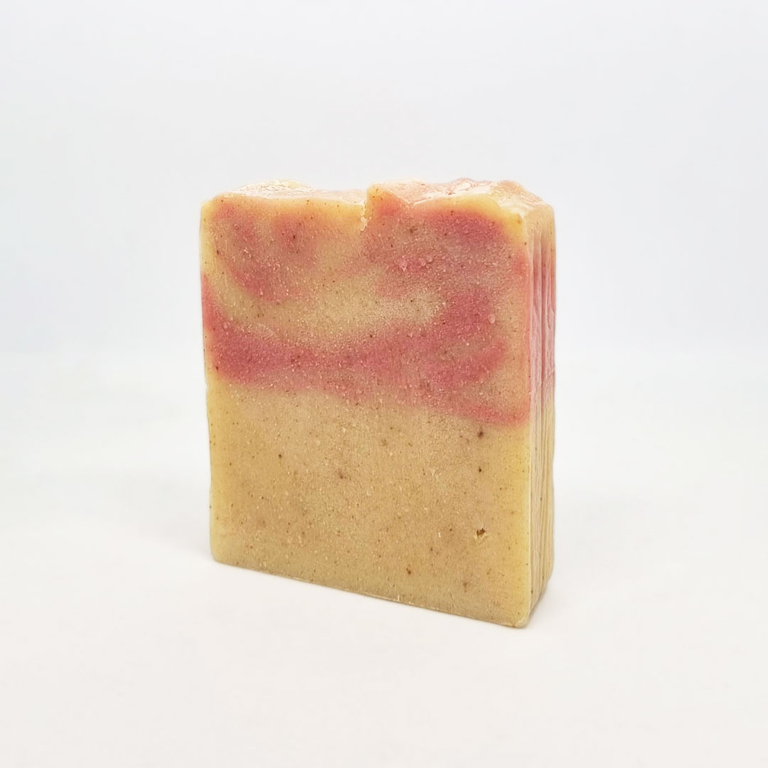 Sabonete de Peónia, Coco e Bergamota Sabonete artesanal retangular rosa e bege com padrão marmoreado