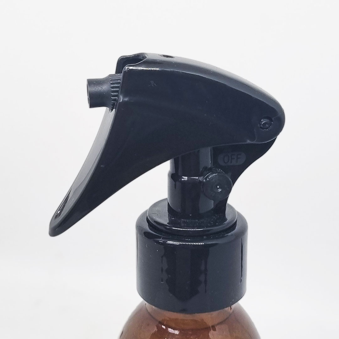 Spray Desembaraçador 100ml Borrifador preto em garrafa de vidro âmbar com fundo branco
