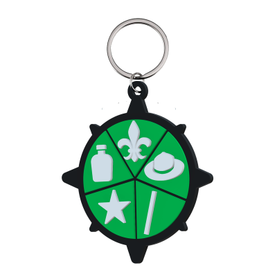 Porta-chaves bússola verde com símbolos brancos