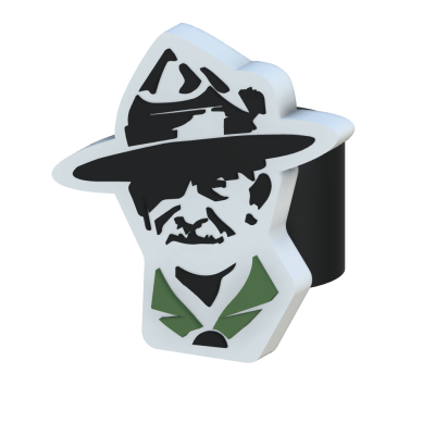 Anel com rosto estilizado de homem com chapéu e gravata borboleta em prata, preto e verde