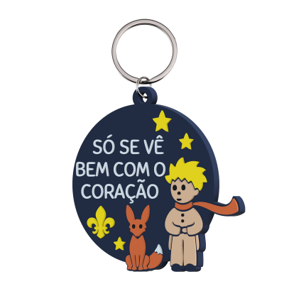 Porta-chaves azul com texto e ilustração do Pequeno Príncipe e raposa