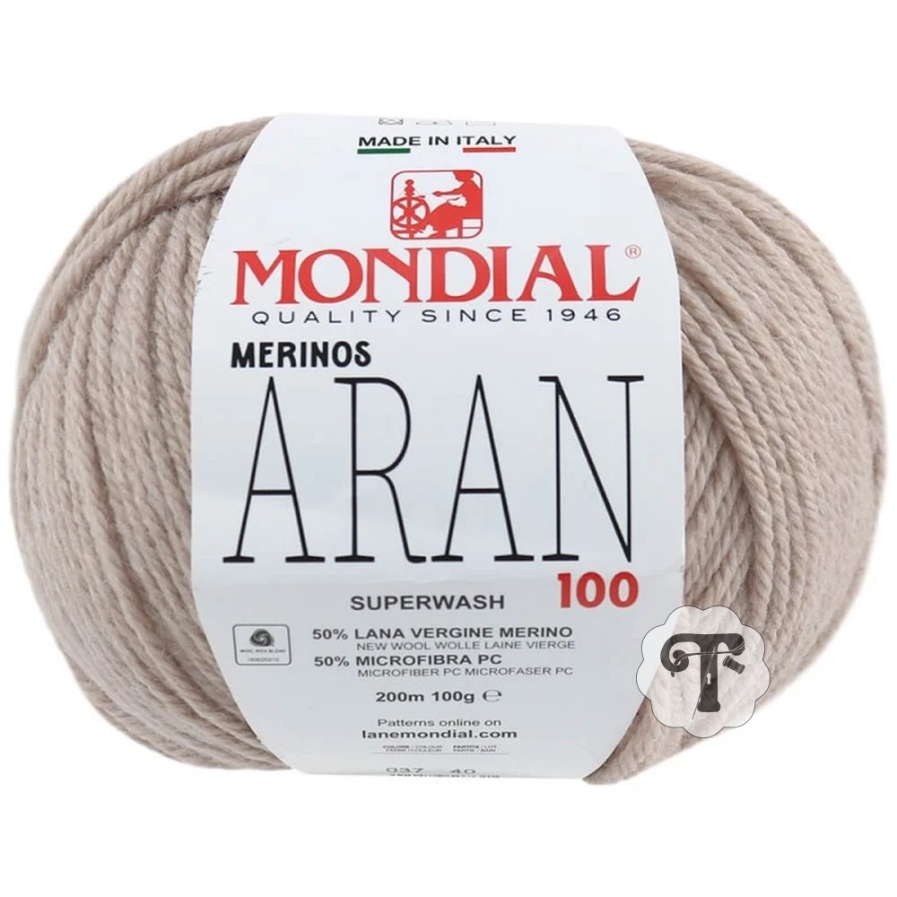 Aran 37 Novelo de lã merino bege claro da marca MONDIAL com rótulo branco.