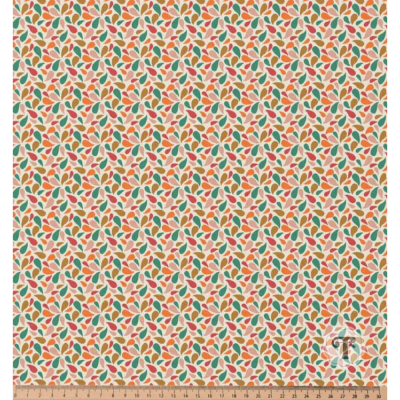 Tecido estampado com folhas coloridas sobre fundo bege e régua para escala