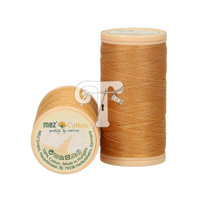 Carretéis de linha de algodão castanha clara com texto no topo do carretel