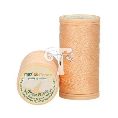 Dois carretéis de linha cor de pêssego com rótulo 'mez Cotton'